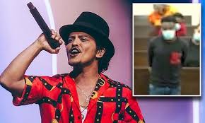 Image result for 2 guys charged pretending to be bruno mars